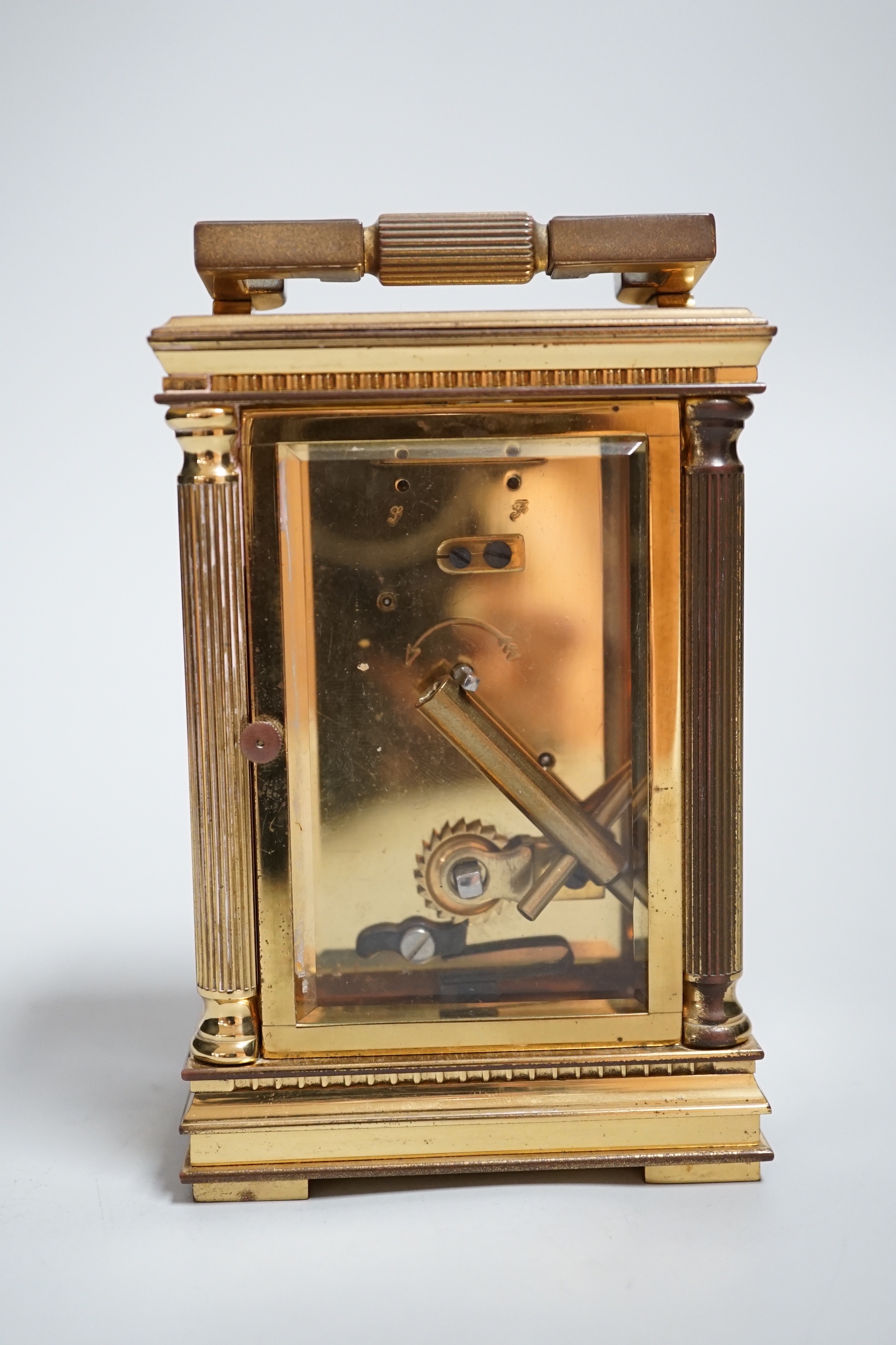 A brass mantel timepiece, retailed by Mappin and Webb, 13cm